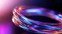 Glowing fiber optic cables with vibrant pink and blue light trails against dark background create dynamic technological pattern for communication concept.