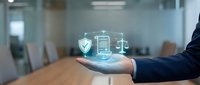 Business professional displaying digital legal compliance icons with scales of justice, document and shield symbols floating above palm in modern office.