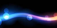 Abstract glowing wave with blue and pink gradient colors on black background, blurred bokeh circles creating magical light effect for modern design projects.