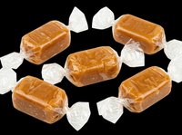 Caramel candies wrapped in clear cellophane isolated on transparent background, ready for clipart, print-on-demand, sublimation, t-shirt design, stickers, and digital crafts.