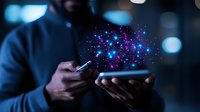 Magical glowing particles emerging between two mobile devices held in dark setting, creating ethereal connection effect for technology and communication concepts.