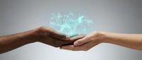 Two hands of different skin tones meet palm-to-palm, exchanging a glowing digital hologram of interconnected network nodes and data streams, symbolizing technology transfer, collaboration, and global connectivity.