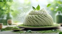 Matcha green tea mousse cake decorated with fresh leaves and powder on green nature background, soft focus dessert photography with bokeh effect.