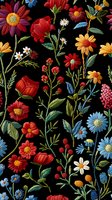 Vibrant embroidered floral pattern on black background with colorful wildflowers, leaves and stems. Seamless repeating design for textile and fabric applications.