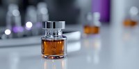 Small glass bottle with amber liquid on blurred laboratory background with bokeh lights and reflective surface, modern minimalist composition.