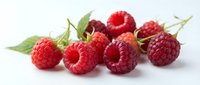 Fresh red raspberries with green leaves isolated on white background, suitable for food, nutrition, and culinary design projects.