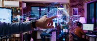 Businessman hand touching holographic brain with digital network connections in modern office environment representing artificial intelligence and technology innovation.