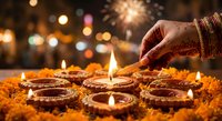Diwali celebration with a henna-decorated hand lighting clay diya lamps on marigold flowers, fireworks glowing in the festive background.