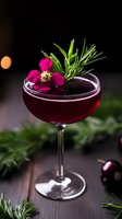 Deep red cocktail in coupe glass garnished with magenta flower and fresh rosemary sprig, dramatic dark background with bokeh lights, styled for luxury bars.