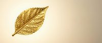 Golden metallic leaf with intricate vein details on cream background, luxury botanical element for premium branding and elegant design projects.