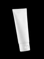 Blank white cosmetic tube isolated on transparent background, ready for skincare, lotion, cream, or beauty product branding and packaging design mockups.
