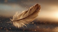 Delicate brown feather floating against golden bokeh background with glowing dust particles, creating ethereal atmospheric mood.