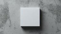 White square box casting shadow on concrete textured wall, minimalist composition with dramatic lighting effect for modern design projects.