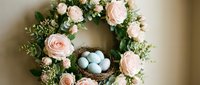 Spring wreath with pink roses, eucalyptus and robin eggs nest for Easter home decor, seasonal door decoration and holiday crafting projects.