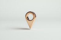 Metallic rose gold location pin marker on light background with soft shadow, minimalist design concept for navigation and mapping applications.