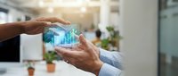 Businessman hands protecting holographic data analytics charts and graphs in modern office environment for business intelligence and digital transformation.