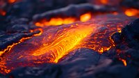 Glowing hot lava flow with vibrant orange and red molten rock patterns creating dramatic natural texture against dark volcanic surface. Extreme close-up view of active magma.