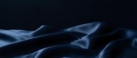Abstract blue smoke waves flowing gracefully against dark background creating elegant ethereal patterns for modern design projects and artistic compositions.