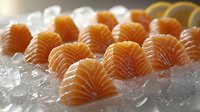 Fresh raw salmon sashimi slices arranged on crushed ice, showcasing delicate fan-shaped cuts with vibrant orange color and marbled texture. Suitable for menu design.