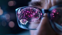 Glowing purple brain hologram seen through eyeglasses lens with bokeh background, representing artificial intelligence and cognitive enhancement technology.