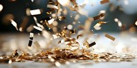 Golden confetti falling and scattering on reflective surface against dark background with bokeh lights, creating festive celebratory atmosphere for special events.