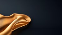 Luxurious smooth golden silk fabric flowing with gentle folds and waves against dark background creates elegant contrast and sophisticated texture for luxury designs.