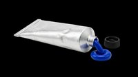 Blue paint tube with metallic silver body and black cap, squeezed with vibrant blue paint flowing out, isolated on transparent background ready for design use on t-shirts, stickers, clipart, and print-on-demand products.