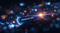 Glowing innovation text with light streaks and bokeh effects on dark background, futuristic digital technology concept for business presentations.
