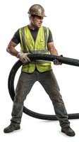 Dirty construction worker in safety vest and hard hat holding industrial hose on white background. Isolated manual laborer ready for design projects.