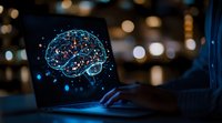 Glowing digital brain hologram on laptop screen with bokeh background, representing artificial intelligence and machine learning technology in dark setting.
