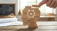 Wooden blocks with business development concepts stacked on desk. Hand placing growth block on top of learning, innovation, positive thinking pyramid.