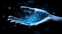 Magical glowing blue particles floating over open palm in dark background, mystical energy concept with sparkles and light effects for spiritual designs.