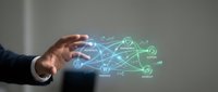 Businessman hand holding glowing network connection diagram with digital icons and lines representing global communication, data transfer, and internet technology infrastructure.