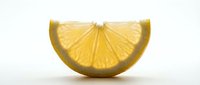 Lemon slice isolated on white background, fresh citrus fruit half cut in half, suitable for food and beverage design projects.
