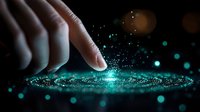 Finger touching glowing turquoise particles creating magical circular light effect against dark background with bokeh lights and sparkles. Suitable for tech concepts.
