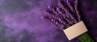 Fresh lavender bouquet with blank card on purple textured background. Aromatic herbs and floral arrangement for spa, wellness, or natural cosmetics marketing.