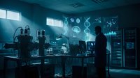 Scientist working in modern laboratory with holographic data displays and advanced equipment for research and development projects.