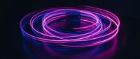 Glowing neon spiral rings in vibrant magenta and cyan create a futuristic abstract composition against dark background for modern design projects.