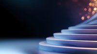 Glowing neon stairs with soft blue and pink gradient illumination against dark background with bokeh lights creating futuristic atmosphere.