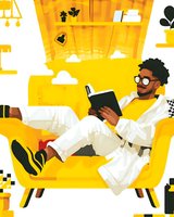 Young African American man in white karate uniform relaxing on yellow armchair, reading book while smiling. Modern minimalist interior with decorative elements in warm tones.