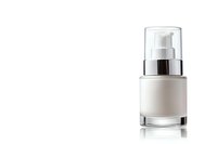 White cosmetic pump bottle with transparent cap on reflective surface against white background, isolated product photography for beauty and skincare packaging.