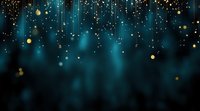Magical glowing golden particles falling on dark turquoise background with bokeh effect, creating dreamy atmosphere for festive design and holiday decorations.