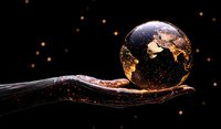 Glowing glass globe with world map resting on dark hand silhouette against black background with bokeh lights, representing global environmental care.