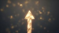 Glowing upward arrow symbol with golden light particles on dark background, representing growth, success, progress and business advancement.