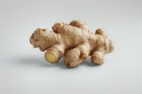 Fresh ginger root with natural texture and light brown skin isolated on white background, perfect for cooking, wellness and natural medicine concepts.