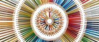Concentric circles of sharpened colored pencils arranged in radiating rings, creating a vibrant mandala-like pattern with white space between layers for art and design projects.