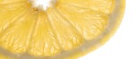 Lemon slice with water droplets isolated on white background, fresh citrus fruit segment for beverage, food, and culinary design projects.