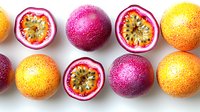 Fresh passion fruits whole and halved showing vibrant pink and orange colors with juicy pulp and seeds arranged in row on white background for food design.
