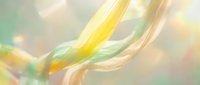 Abstract flowing waves in soft yellow, green and peach colors creating elegant motion blur effect for modern digital backgrounds and creative designs.