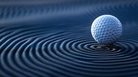 White golf ball creating ripple effect on dark blue water surface with concentric circles, dramatic lighting highlights sphere texture. Sports and motion concept.